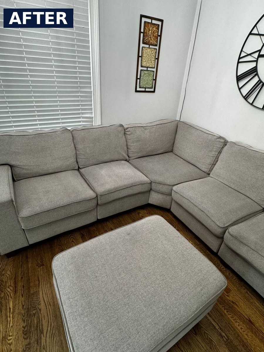 The same sectional sofa and ottoman after cleaning, with brighter and more even-looking cushions
