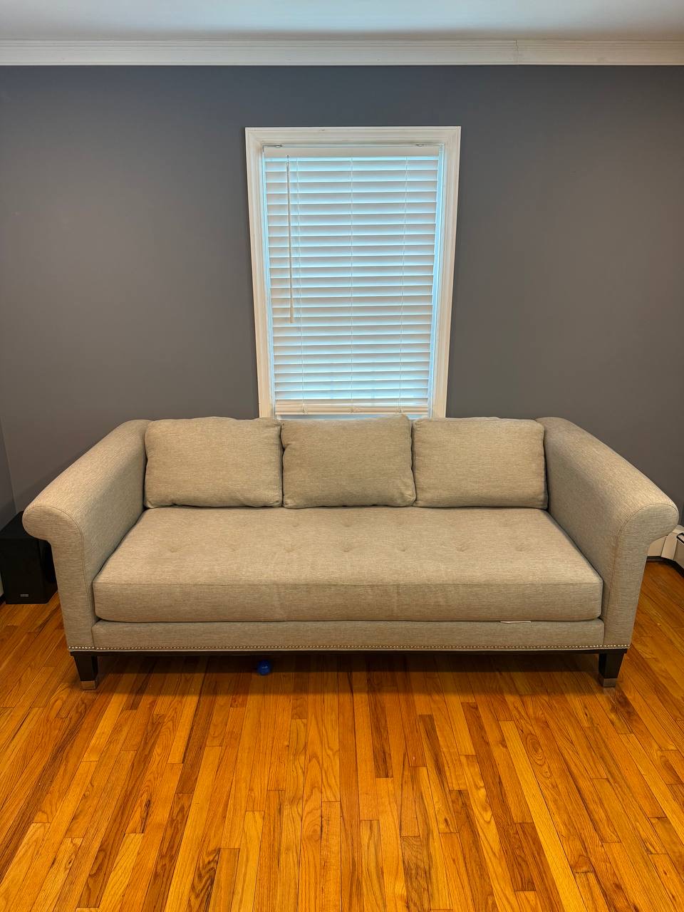 Same light sofa with a more even-looking seat after Stain Steamer cleaning